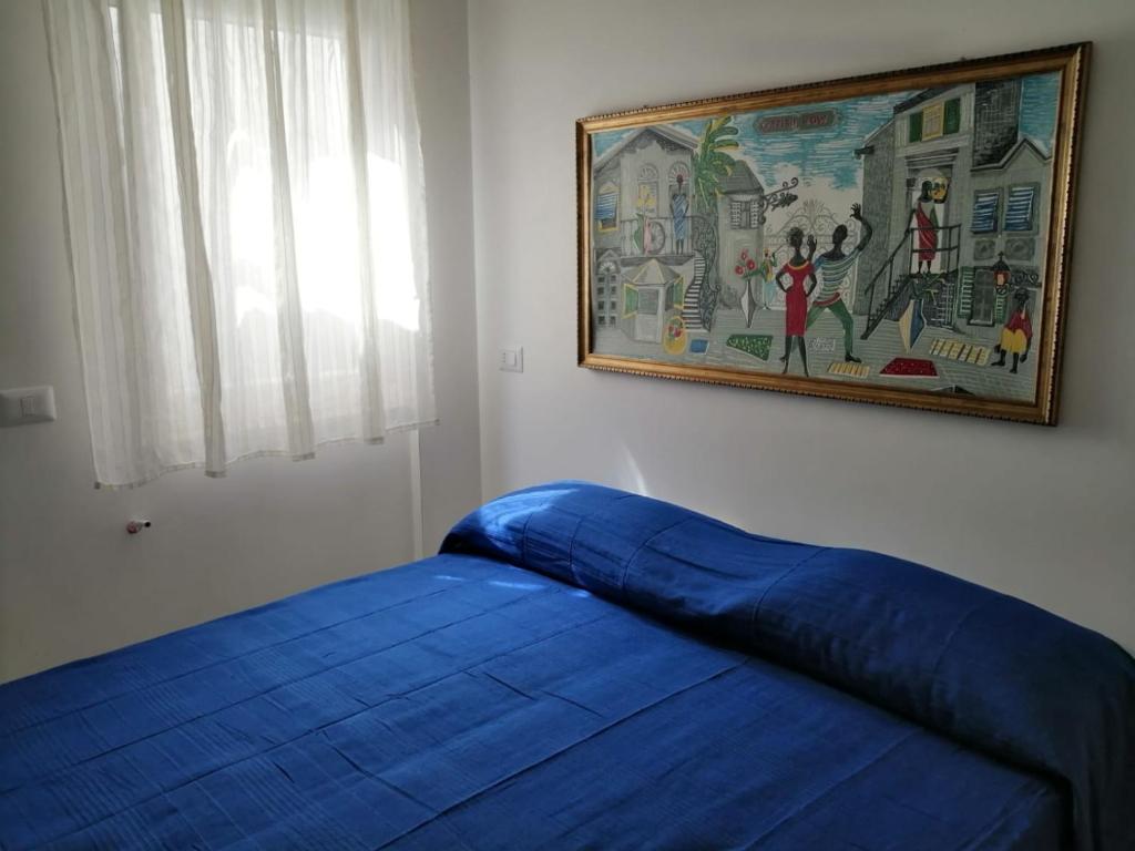 Pozzo dei Desideri Appartamenti客房内的一张或多张床位