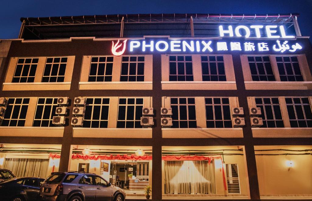 话毛生Phoenix Hotel的前面有标志的酒店