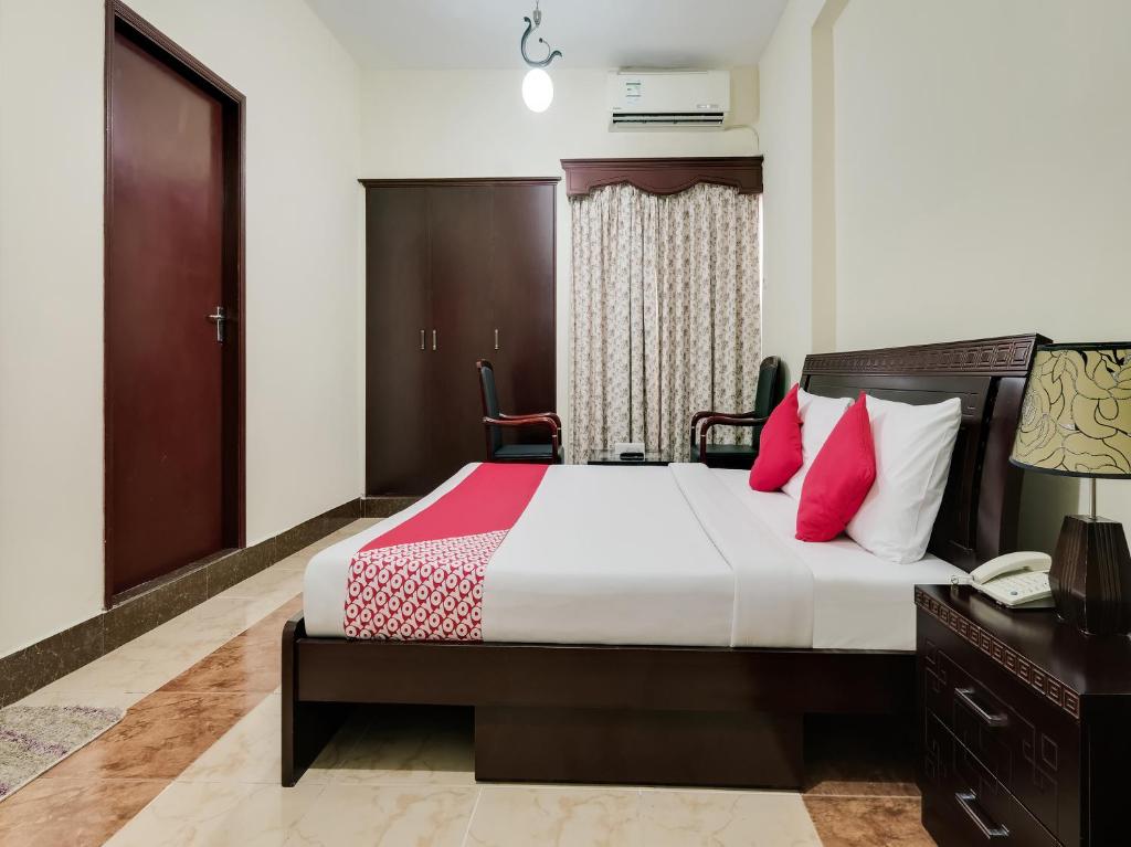 Al Rayan Hotel客房内的一张或多张床位