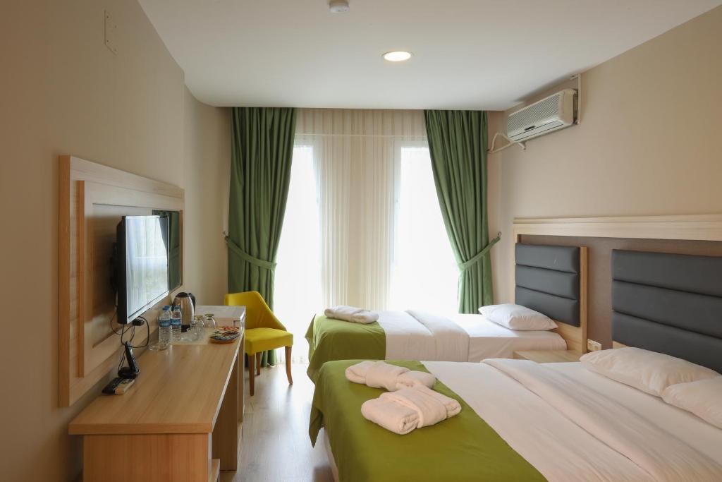 Samsun Osmanlı Otel客房内的一张或多张床位