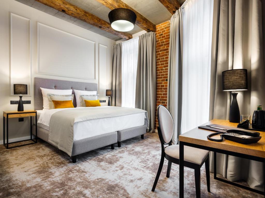 Hotel Wawel Queen客房内的一张或多张床位