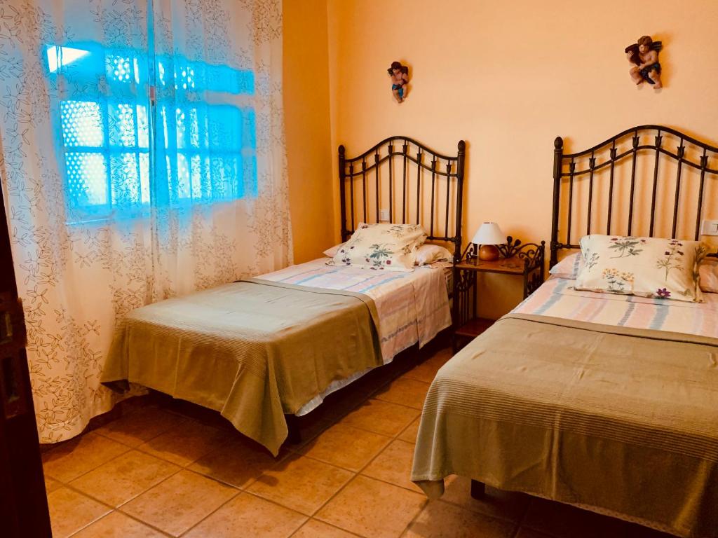 Apartamentos Isla Encantada客房内的一张或多张床位