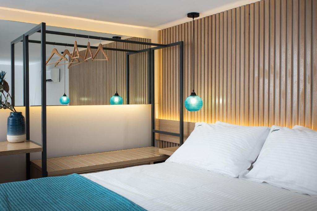 Lignum Suites Chania客房内的一张或多张床位