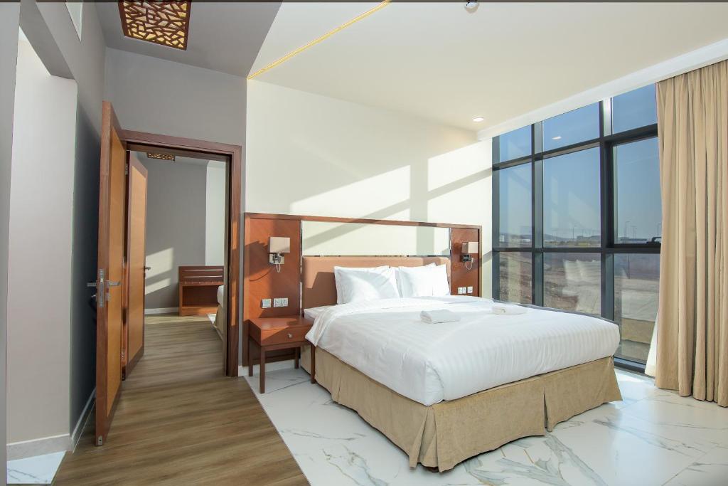 Muscat Gate Hotel客房内的一张或多张床位
