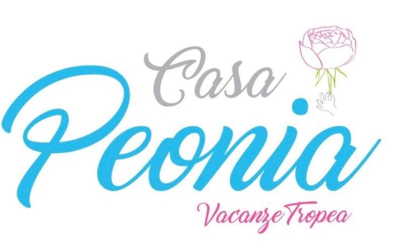 特罗佩阿Casa Peonia的花朵花香的标志