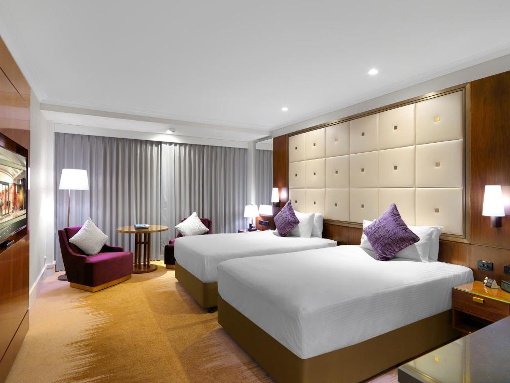 悉尼阿莫拉吉姆森酒店客房内的一张或多张床位