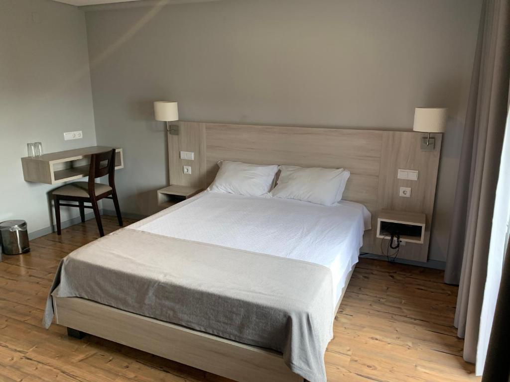 丰特鲁米诺萨酒店客房内的一张或多张床位
