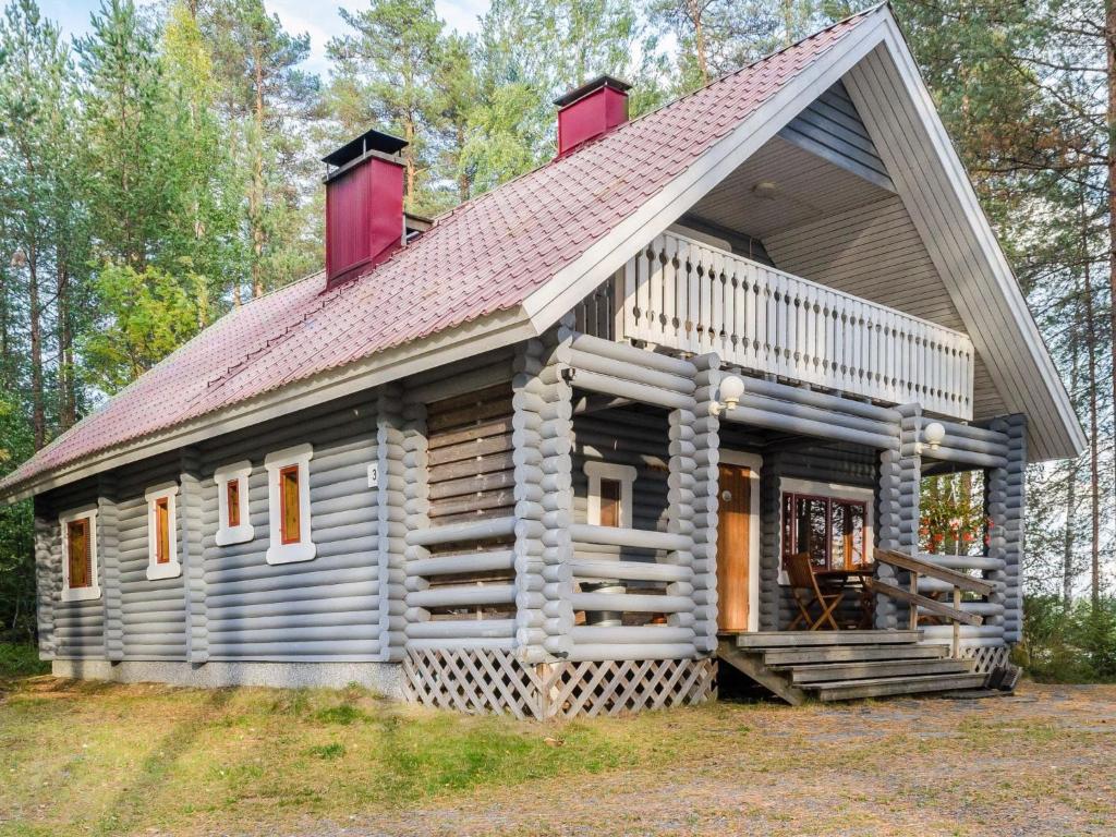 AhmovaaraHoliday Home Metsätähti by Interhome的小木屋,设有 ⁇ 篷