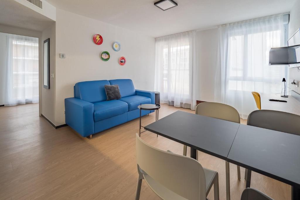 Apparthotel Le Hüb Grenoble的休息区