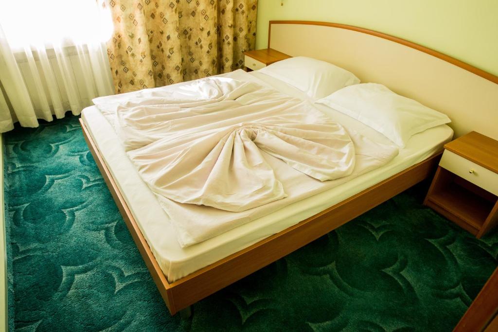 斯特鲁马酒店客房内的一张或多张床位