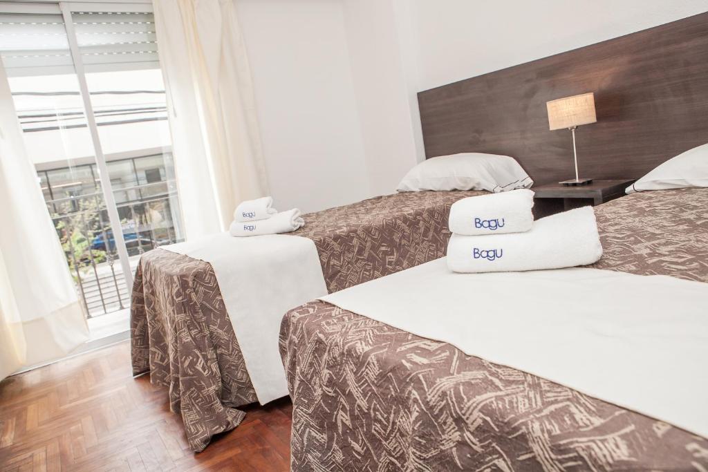 Bagu Santander Hotel客房内的一张或多张床位