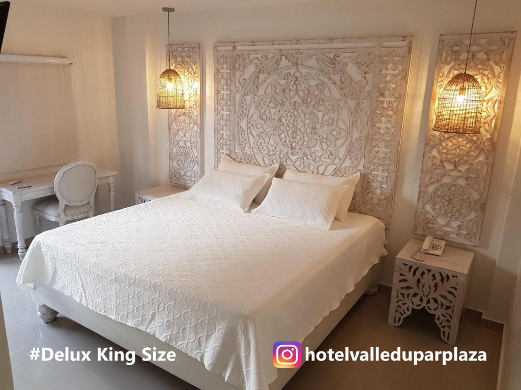 Hotel Valledupar Plaza客房内的一张或多张床位