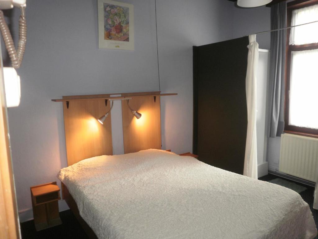 Le Liège客房内的一张或多张床位