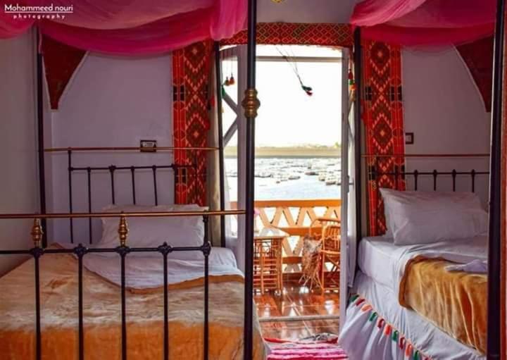 Old Nubian guest house客房内的一张或多张床位