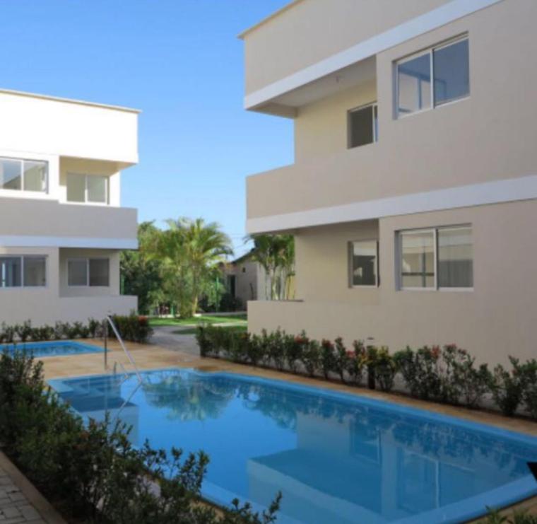 皮帕Zapipou - Apartamento aconchegante para você aproveitar o melhor de Pipa的一座房子,旁边设有游泳池