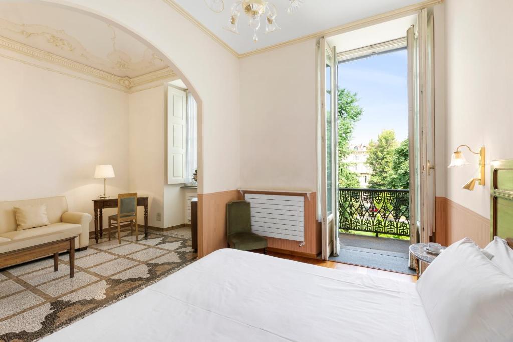 罗马和凯沃尔岩酒店客房内的一张或多张床位