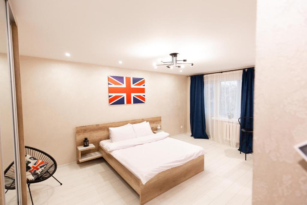 London-style Apartment Rivne,Ukraine客房内的一张或多张床位