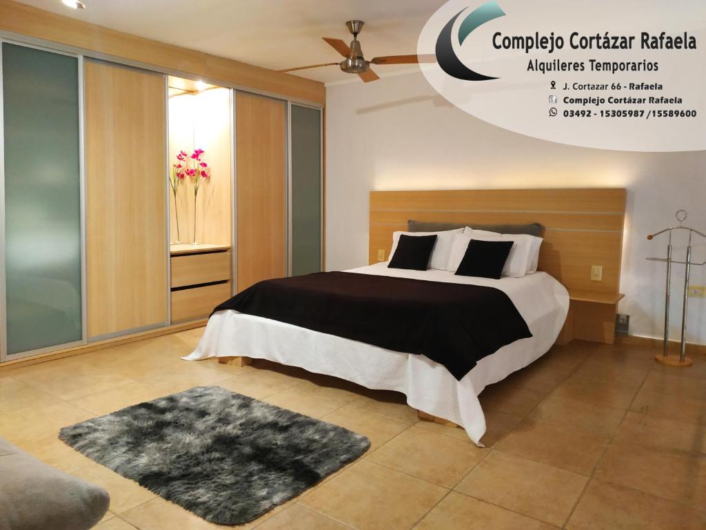 Complejo Cortazar Rafaela客房内的一张或多张床位