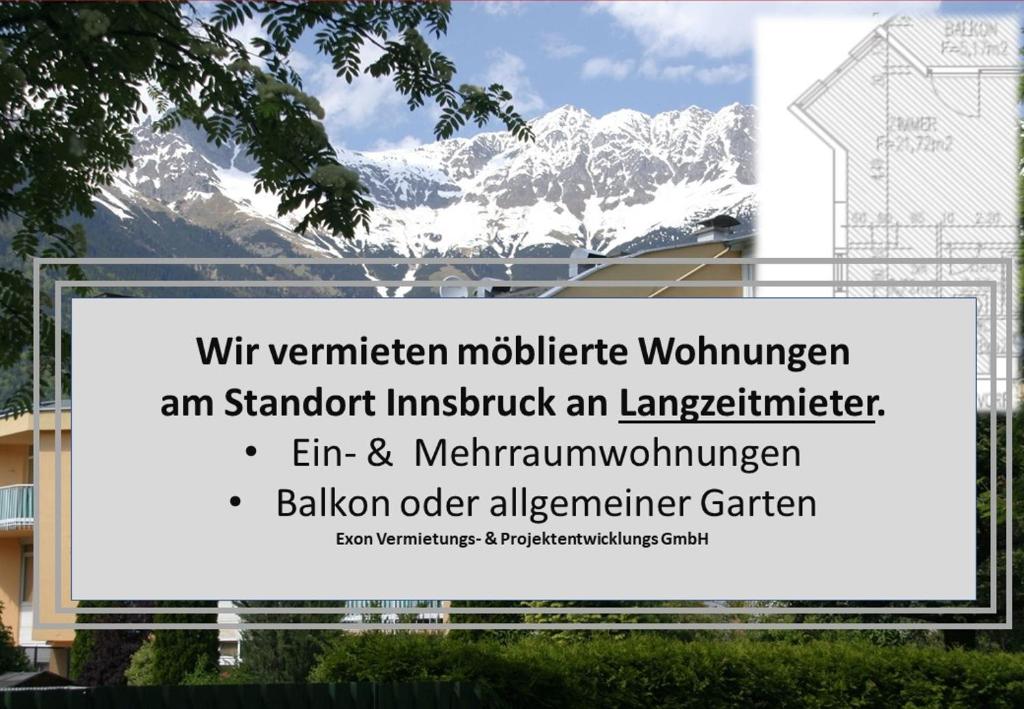 因斯布鲁克Wohnen in Innsbruck的雪覆盖的山前的标志