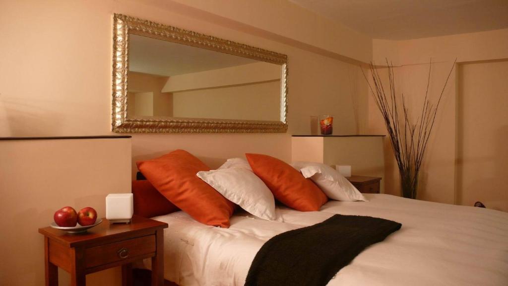 洛坎达德尔科西酒店客房内的一张或多张床位