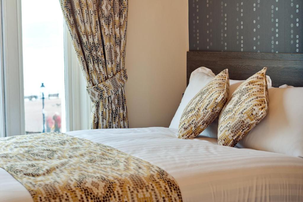 Lauriston &amp; Lawton Court Hotel客房内的一张或多张床位