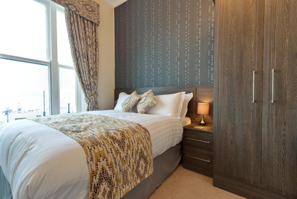 Lauriston &amp; Lawton Court Hotel客房内的一张或多张床位