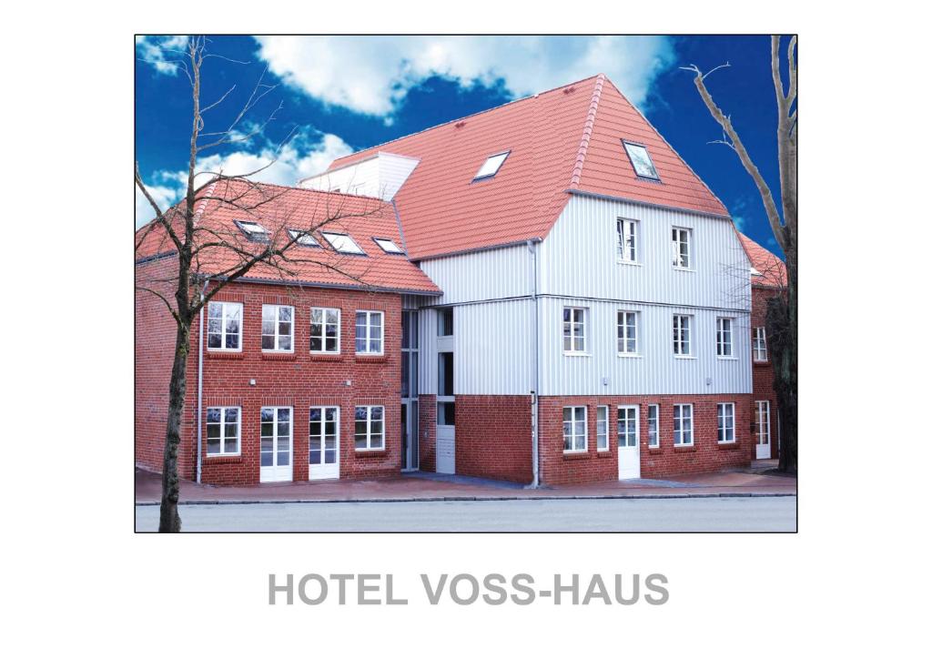 奥伊廷Voss-Haus的一座红色屋顶的建筑