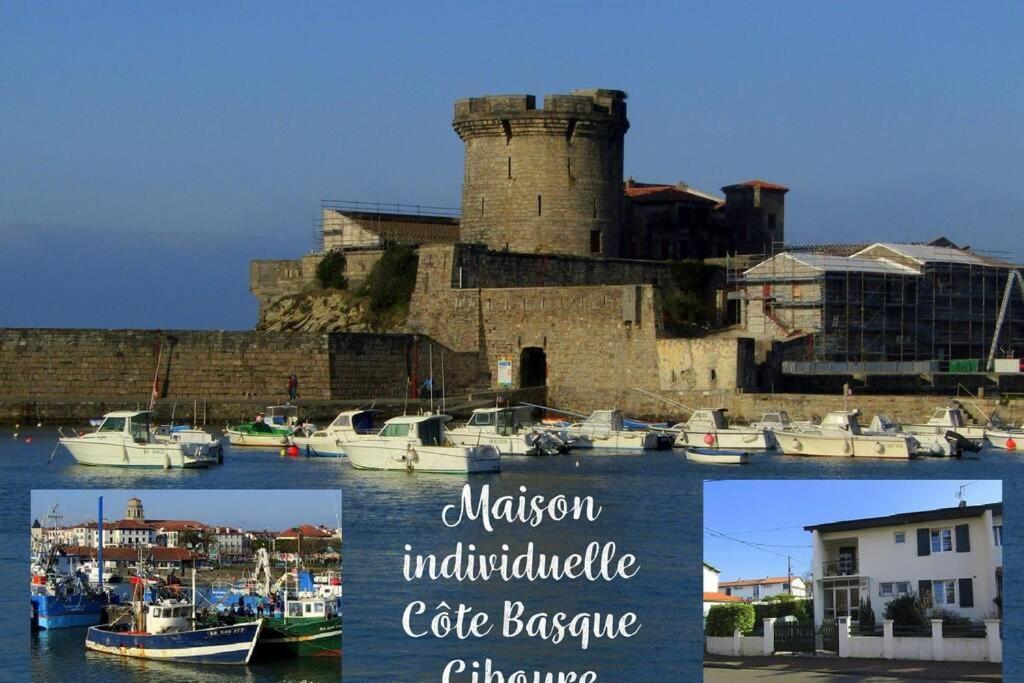 西布勒Maison individuelle Côte Basque ( Ciboure )的城堡照片的拼合物,在水中划船