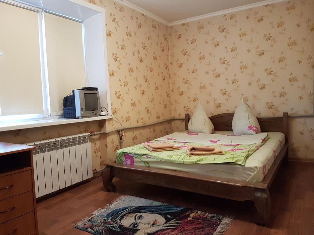 2-room Apartment on Ukrainskaya Street 43. Center客房内的一张或多张床位