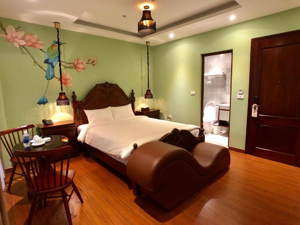 Le Grand Hanoi Hotel - The Oriental客房内的一张或多张床位