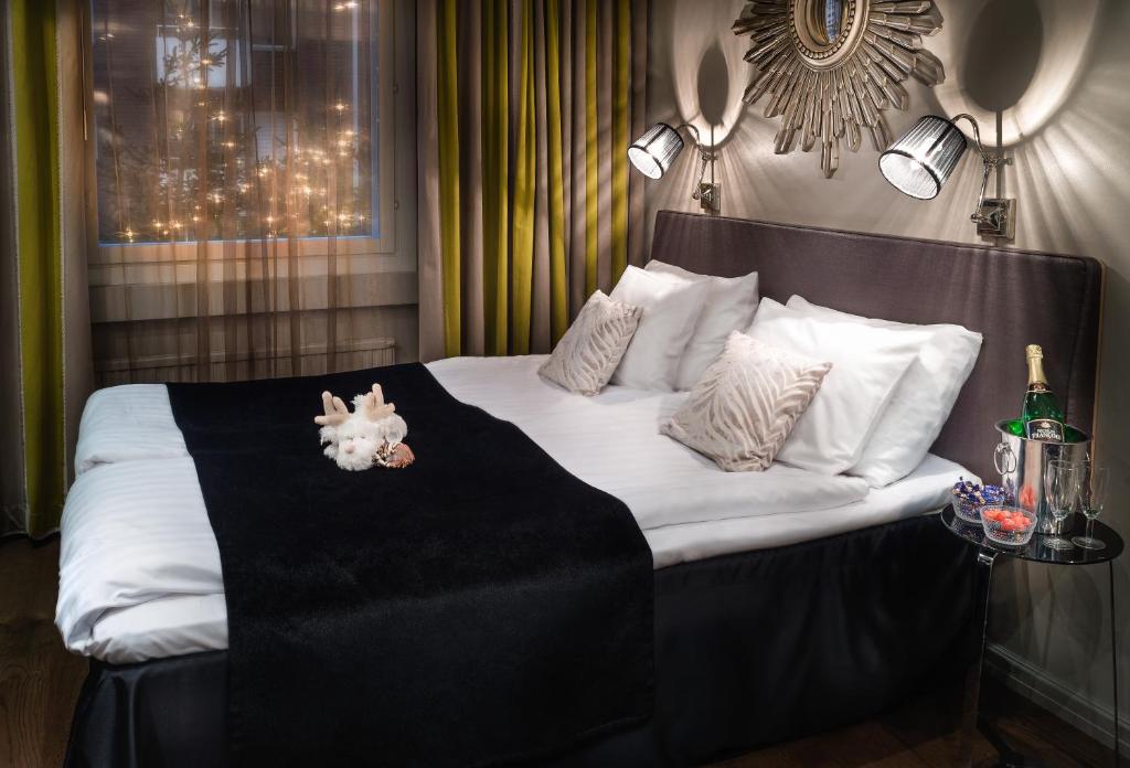 北极城市酒店客房内的一张或多张床位