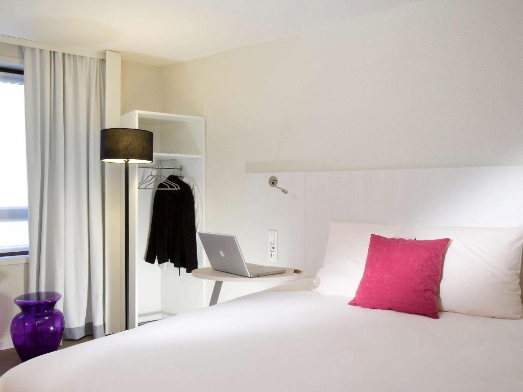 里尔中心贝法火车站宜必思尚品酒店客房内的一张或多张床位