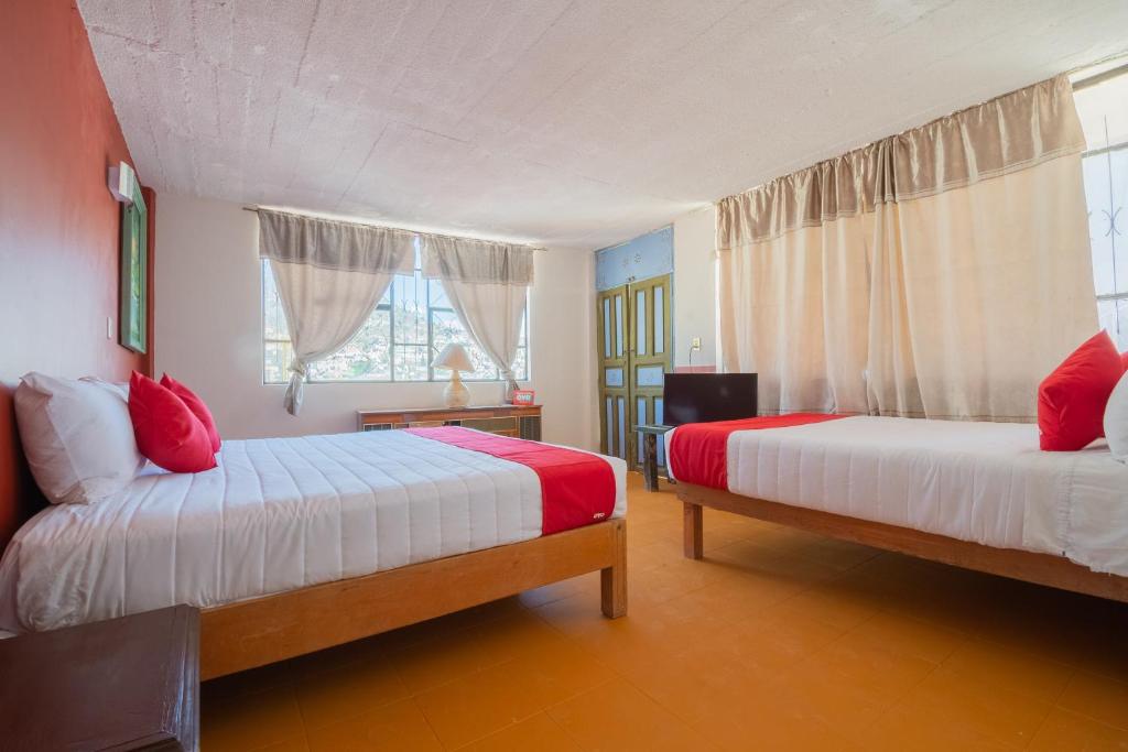 OYO Hotel Meson de la Concepcion客房内的一张或多张床位