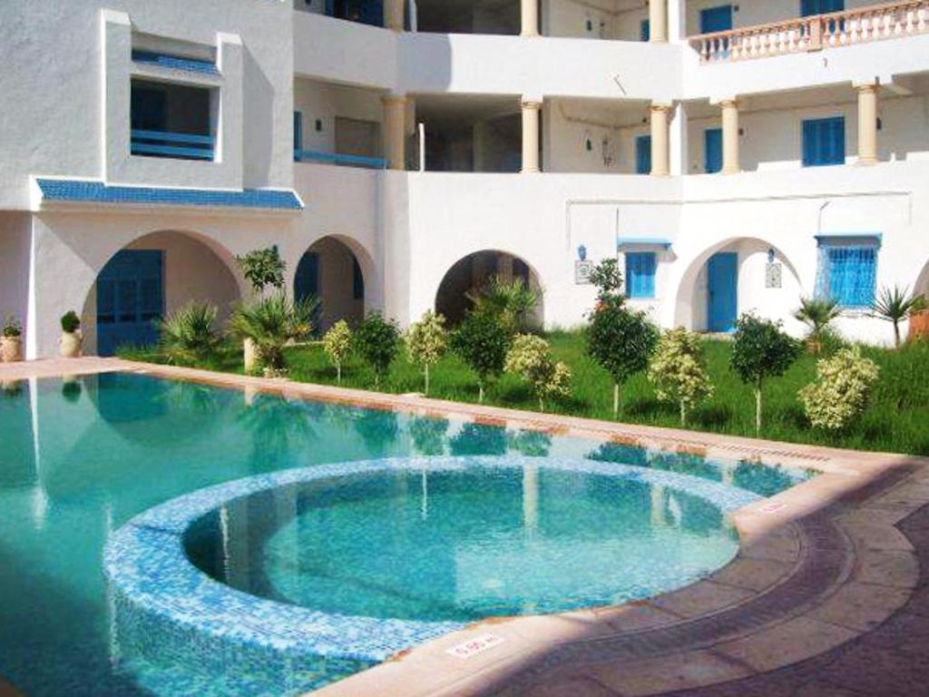 甘达坞伊港One bedroom appartement at Akouda 200 m away from the beach with shared pool and enclosed garden的相册照片