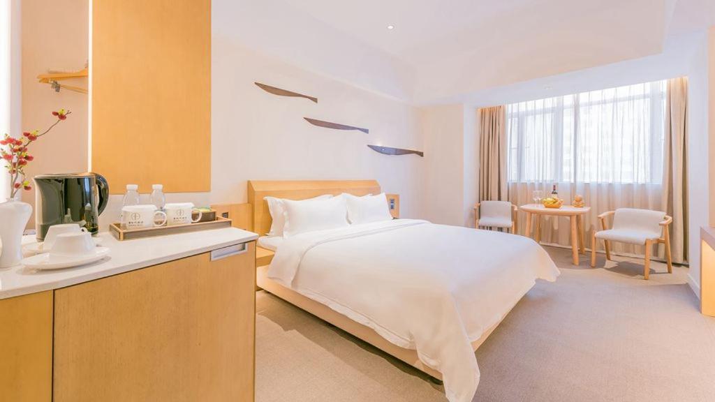 喜悦门酒店(佛山乐从家具城店) 立即预订