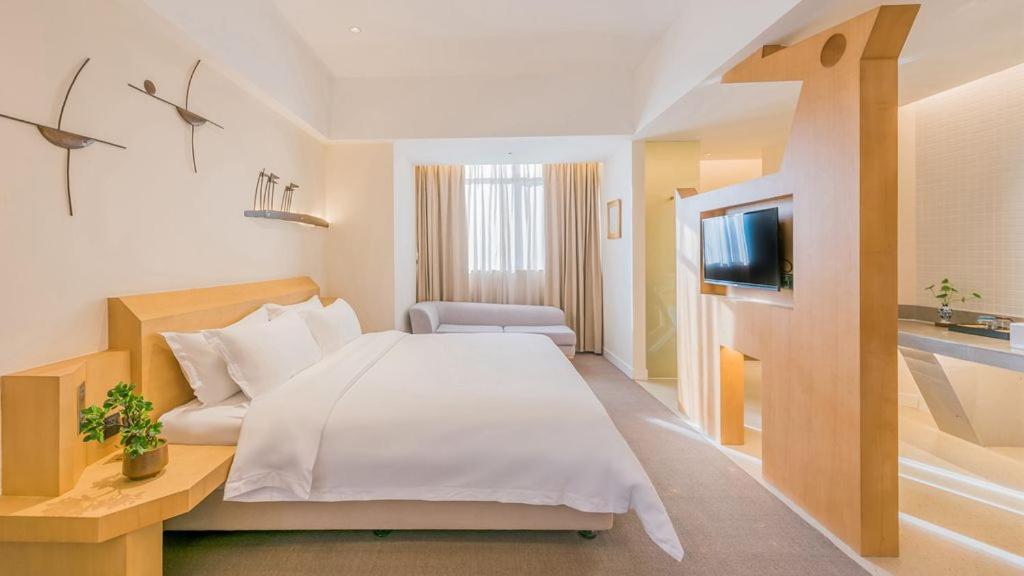 喜悦门酒店(佛山乐从家具城店) 立即预订