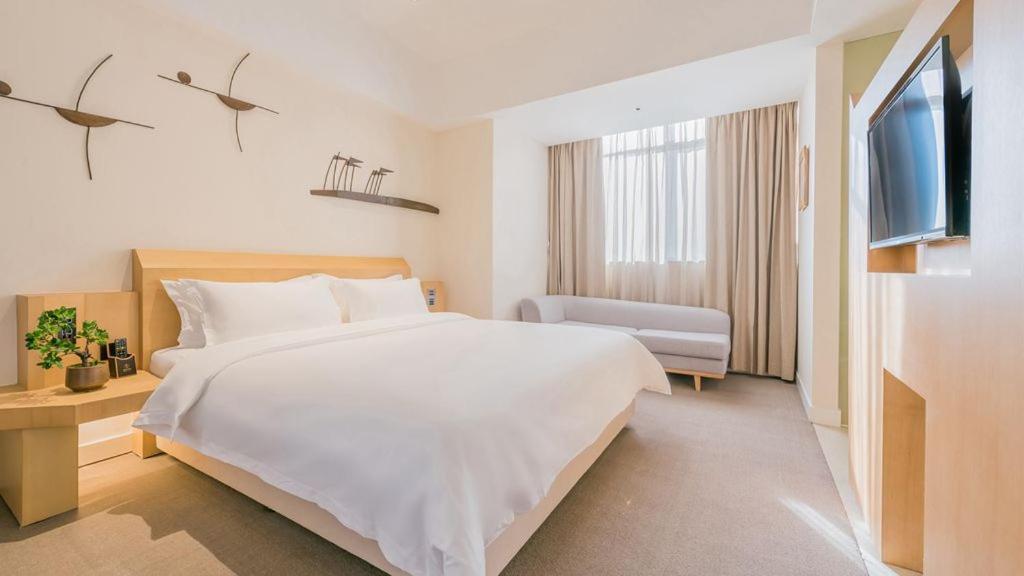 喜悦门酒店(佛山乐从家具城店) 立即预订