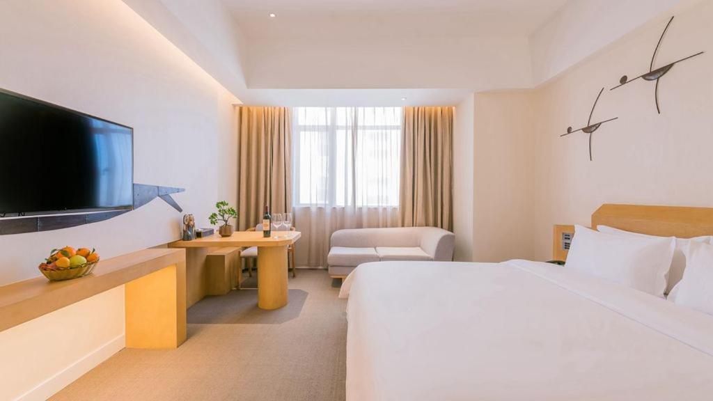 喜悦门酒店(佛山乐从家具城店) 立即预订