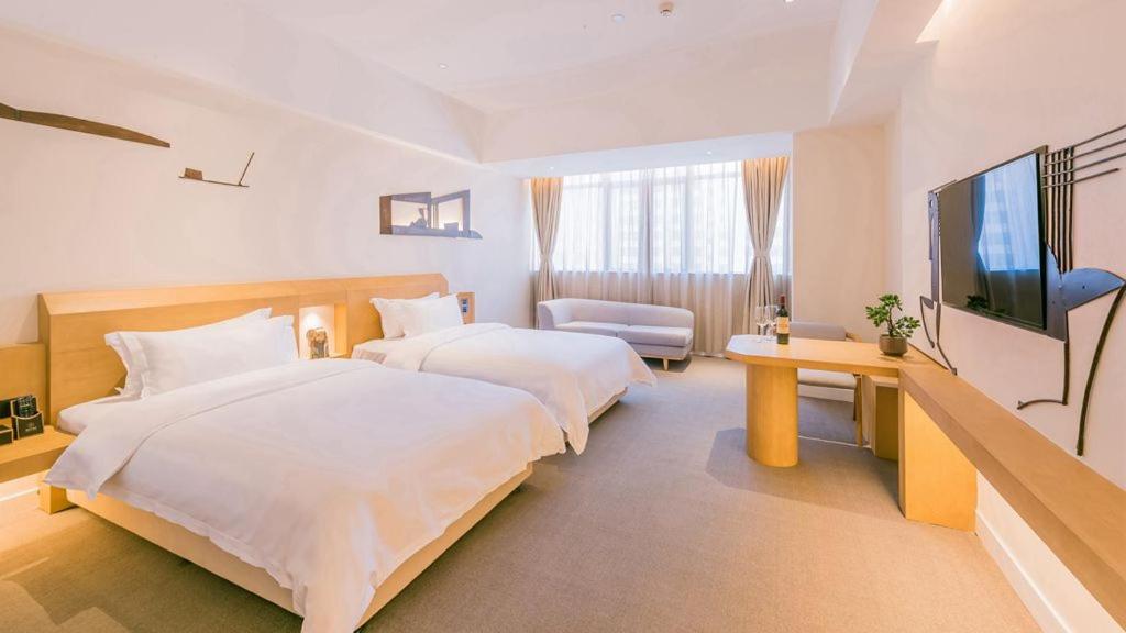 喜悦门酒店(佛山乐从家具城店) 立即预订