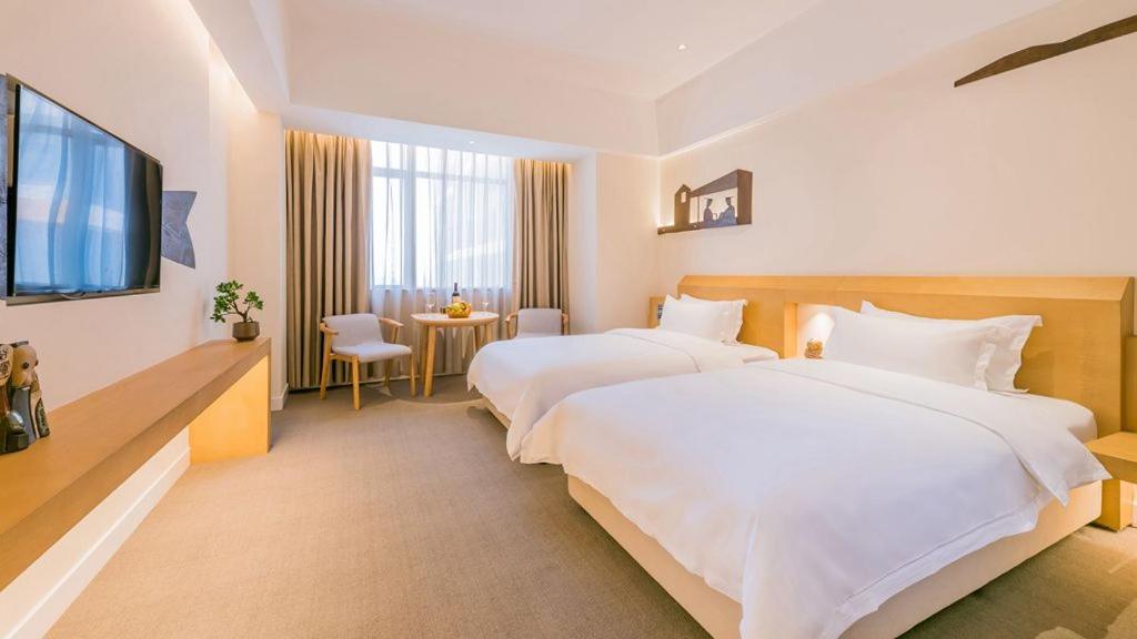 喜悦门酒店(佛山乐从家具城店) 立即预订