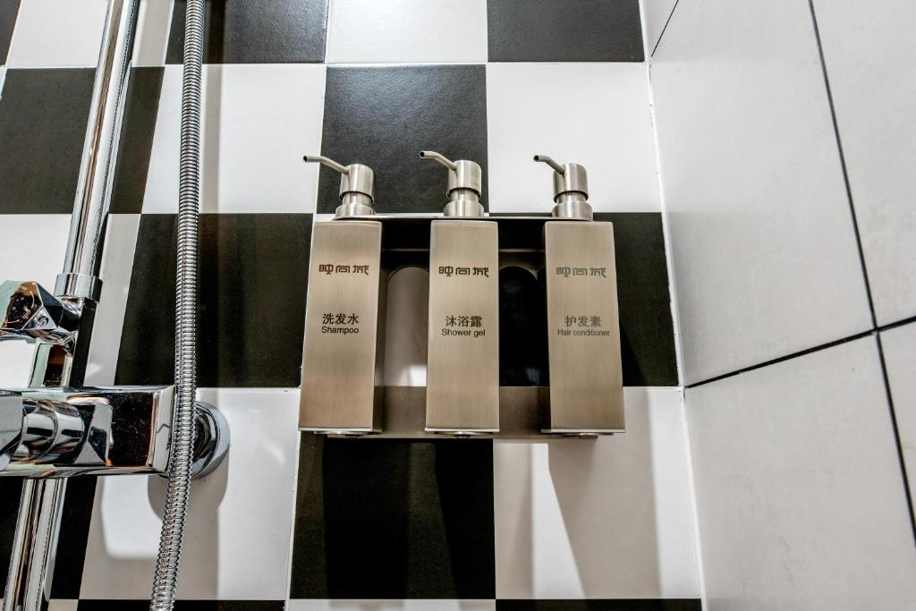 Happy Dragon City Culture Hotel-Tianjin Draum Tower &amp; Dayuecheng shopping mall的一间浴室