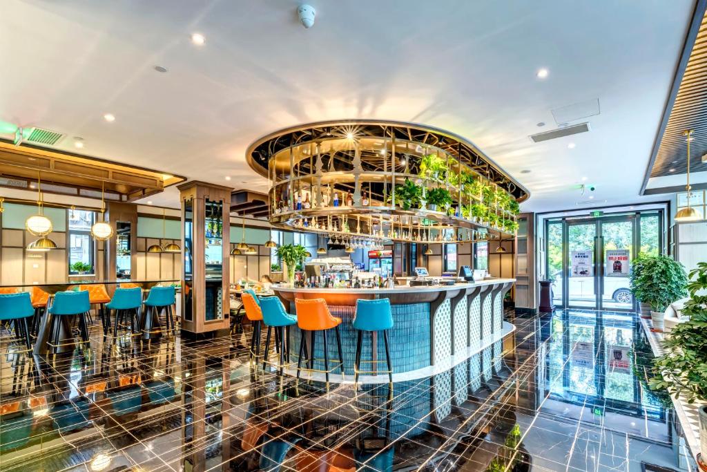 Happy Dragon City Culture Hotel-Tianjin Draum Tower &amp; Dayuecheng shopping mall餐厅或其他用餐的地方