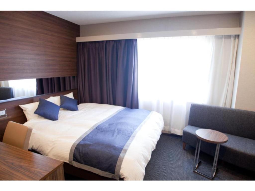 Hotel Il Credo Gifu - Vacation STAY 84624客房内的一张或多张床位