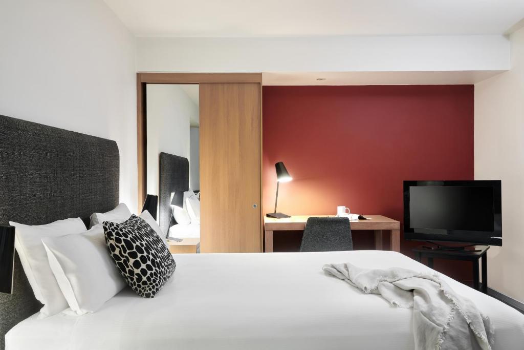 普特希尔公寓酒店 - 小博克客房内的一张或多张床位