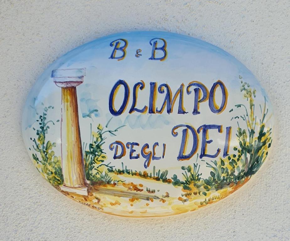 阿杰罗拉Olimpo degli Dei的墙上的记号读了深厚的债务