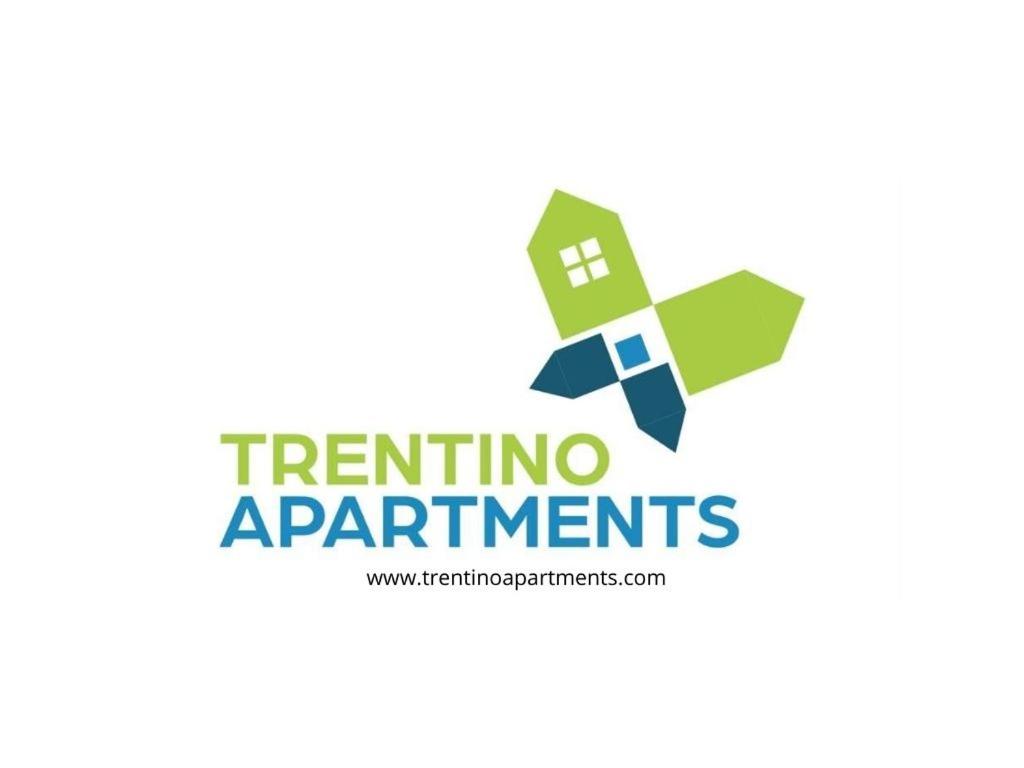 福尔加里亚Trentino Apartments - Casa Marzari的用于三项全能服饰网站的标志