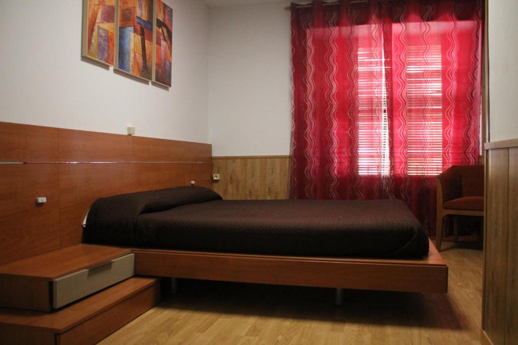 Pensión San José客房内的一张或多张床位
