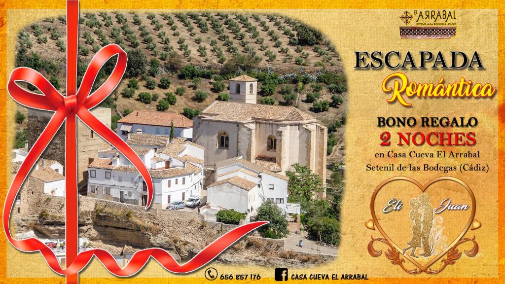 塞特尼尔Casa Cueva El Arrabal的一张带有红丝带的村庄照片的传单