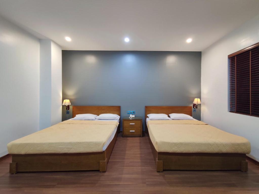 吉婆岛吉恩诺克酒店的配有2张床的客房