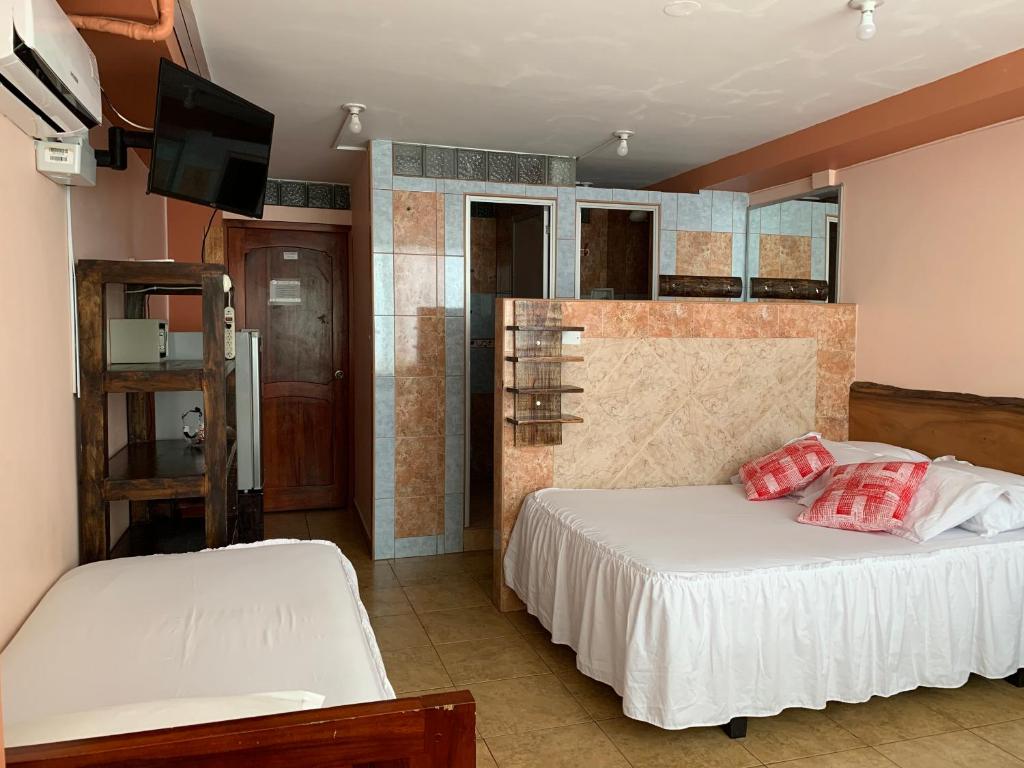 Hotel la Barca客房内的一张或多张床位
